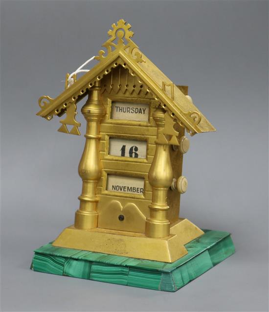 A late 19th century Russian ormolu and malachite desk calendar